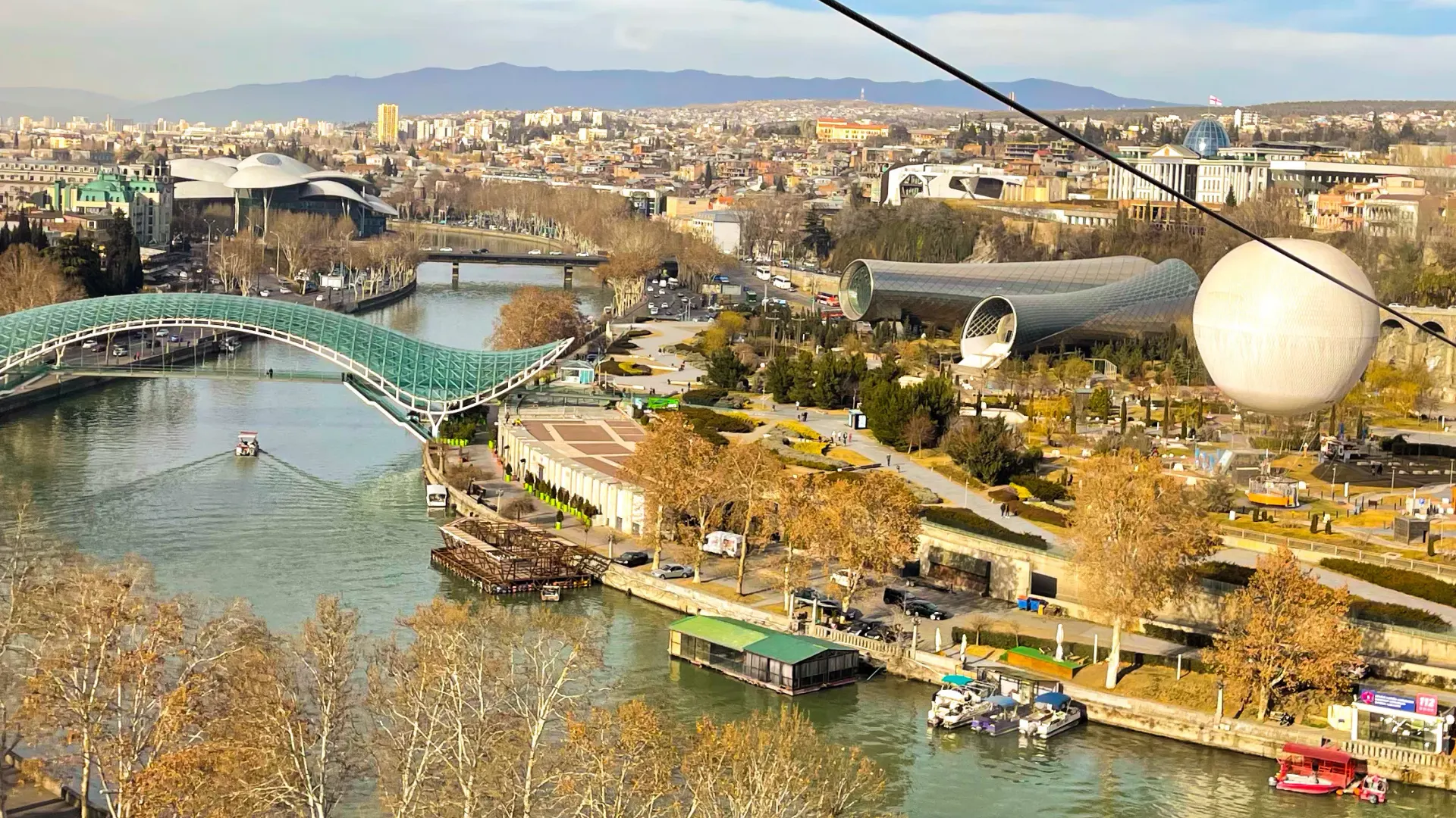 The Bridge of Peace and Rike Park in Tbilisi from the cable car
