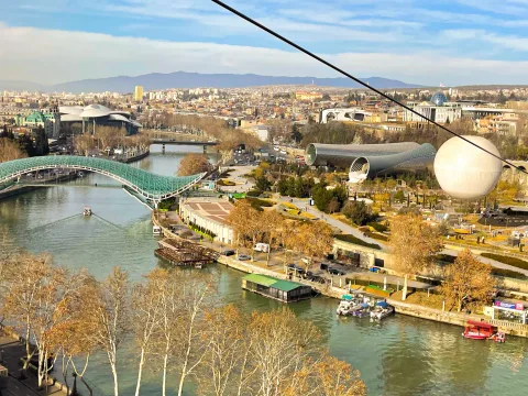 The Bridge of Peace and Rike Park in Tbilisi from the cable car
